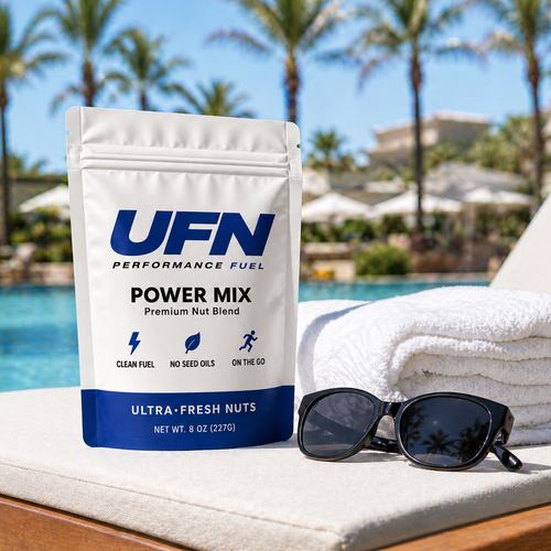 UFN Power Mix package with sunglasses and towel by a poolside